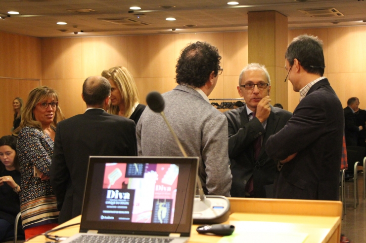 El ministre de Turisme, Francesc Camp, al centre abans de la presentació dels resultats de 'Diva'.
