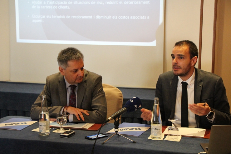 El ministre d'Economia, Competitivitat i Innovació, Gilbert Saboya, i el soci director del Registre de Morositat, David Castillo.
 
 