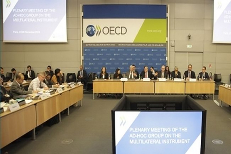 Una reunió celebrada a la seu de l'OCDE.